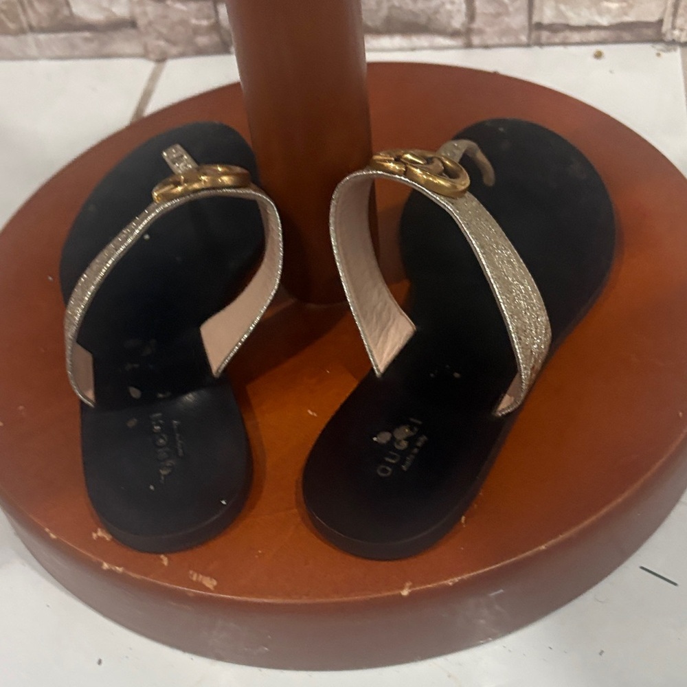 Gucci Black Footbed Sandals with Gold Metallic Straps